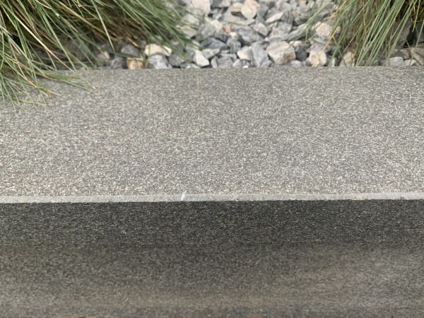 Black granite edging close up 