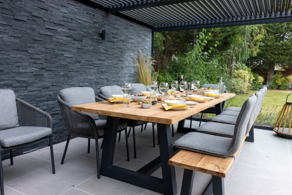 outdoor kitchen with grey textured stone cladding