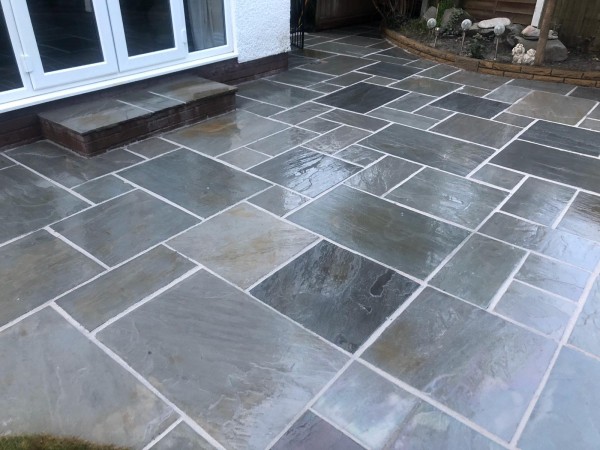 nicely grouted natural limestone patio