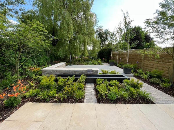 Sinai Pearl Beige Honed/Tumbled Limestone Paving in a formal garden layout