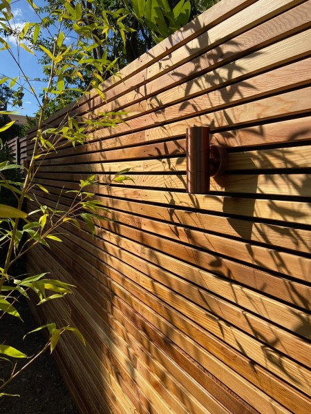 garden fence created from horizontal cedar battens