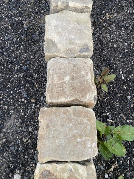 Reclaimed cobbles used as edging 