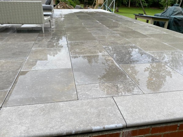 this is what sinai pearl grey limestone pavers look like when wet