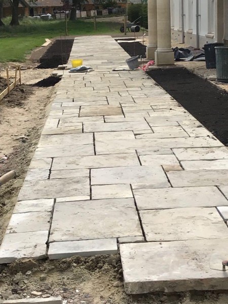 Recalimed Yorkstone Paving being laid