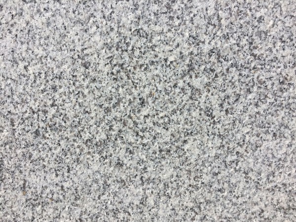 swatch of light grey/silver granit paving stone