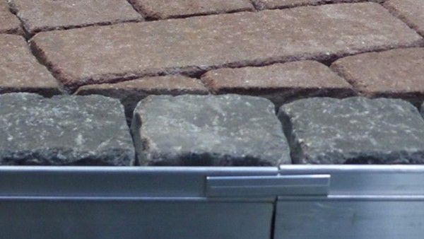 aluminium edging beside block paving