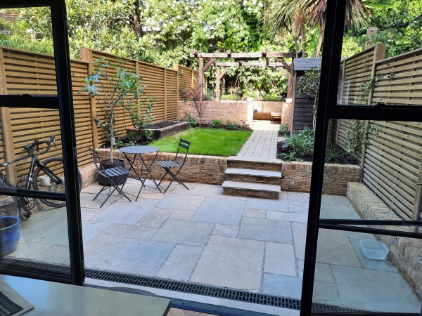 patio created with antique yellow limestone paving
