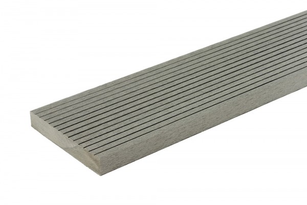 Grey solid composite decking board with textured surface