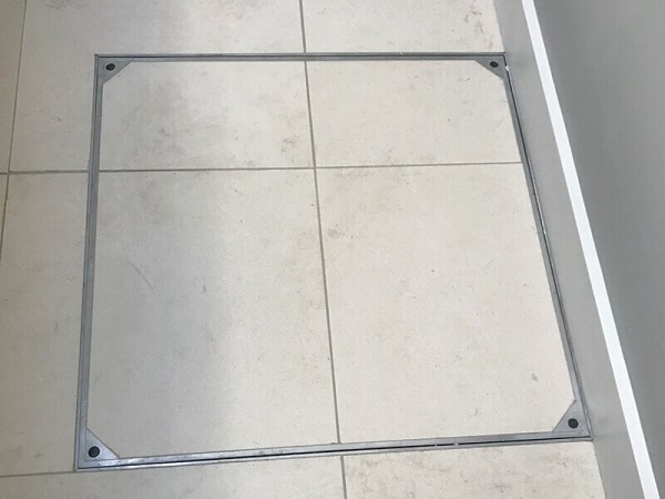 porcelain pavers with recessed manhole cover