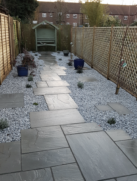 Sandstone paving path with gravel edging 