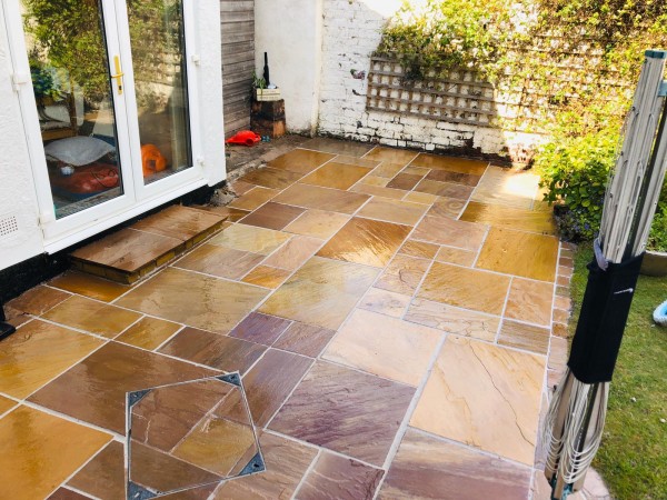 Buff and brown patio slabs grouted with Patio Grout