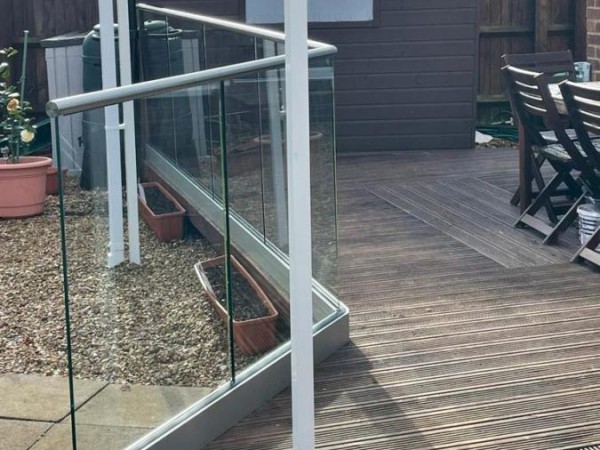 Decking edged with Glass Balustrades