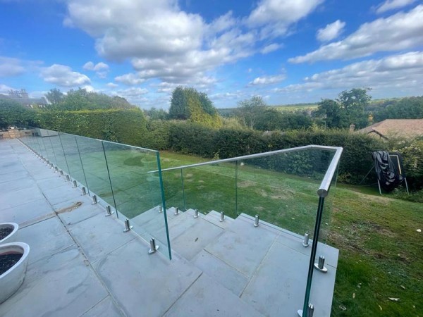View through Glass Balustrades over garden 