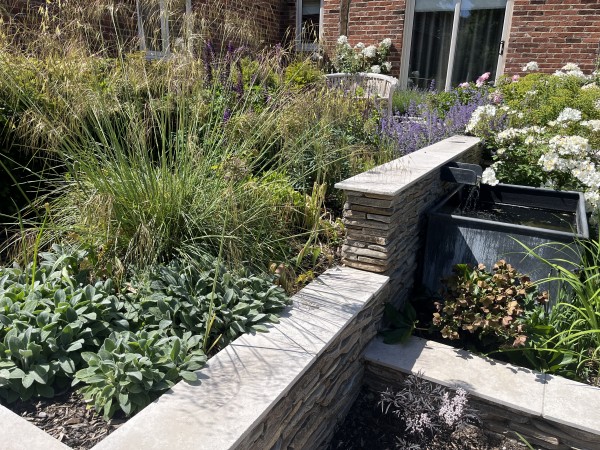 Grey Paddlestones in a garden setting