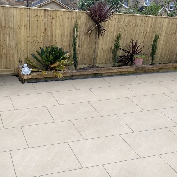 Patio created from silicone white porcelain paving