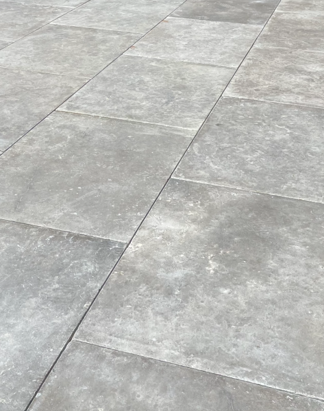 Sinai pearl grey honed/tumbled limestone pavers laid in traditional brickwork pattern