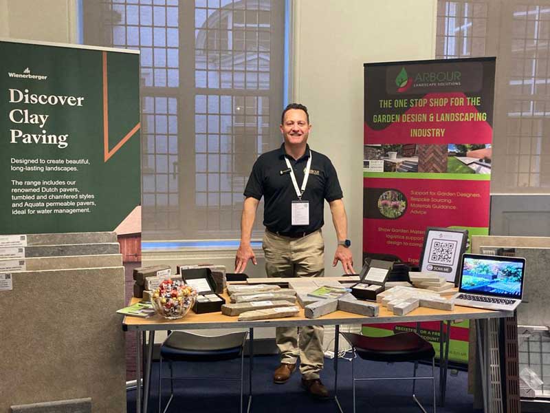 Richard Bickler with a display of landscaping materials