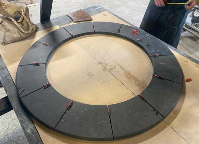 bespoke fire pit copings being fashioned in the workshop from uk sourced slate