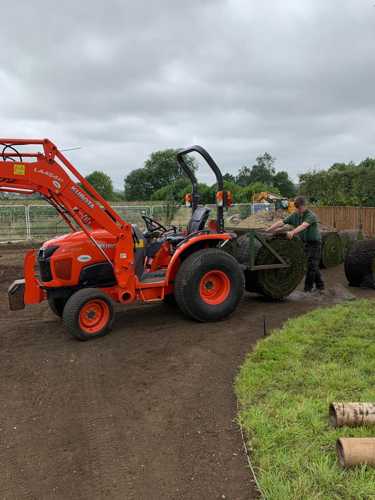 laying big roll turf