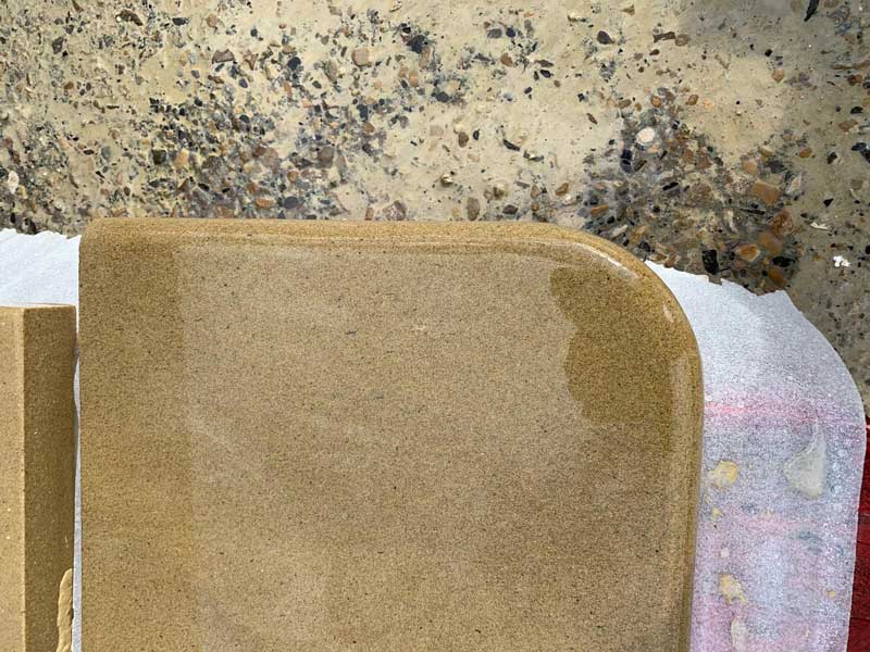 sandstone bench top with profiled edges and curved corners