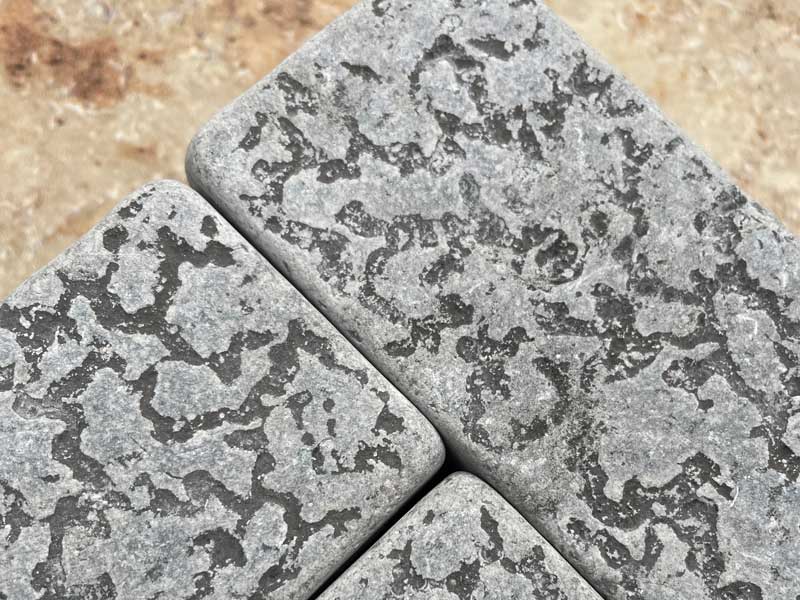 samples of egyptian meli dark grey limestone with an acid etched surface