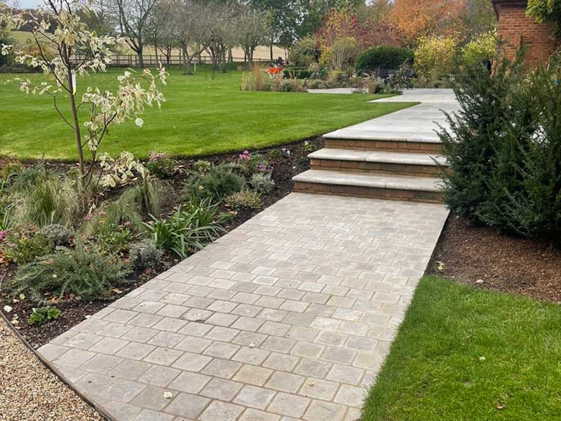 garden designed by Judy Shardlow with beautiful lawns, planting and limestone paths