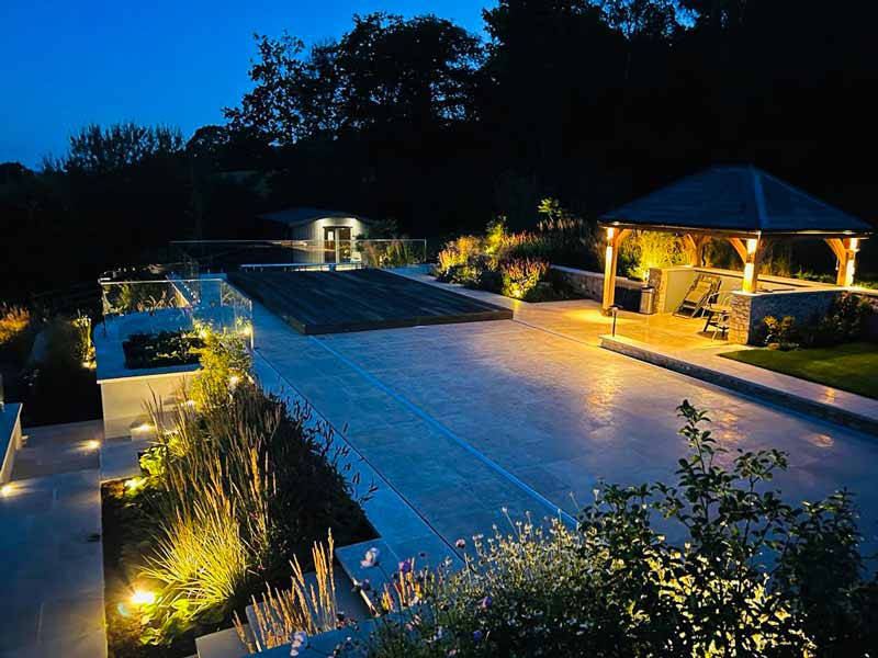 Terraced garden designed by Katherine Crouch lit for evening use