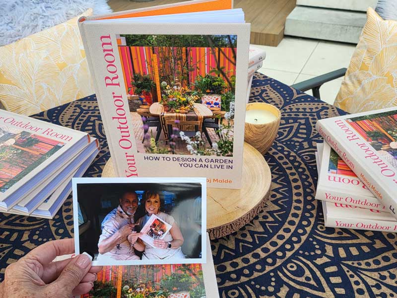great memory shot of Manoj Malde book signing at Arbour Landscape Solutions