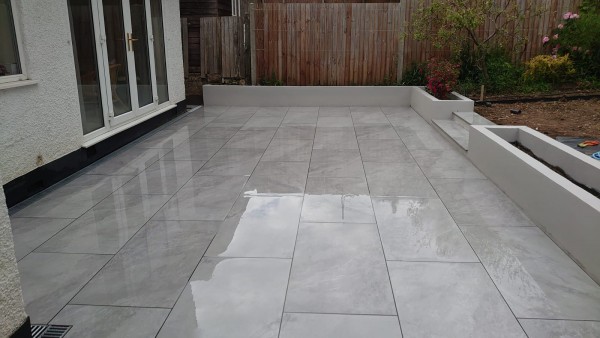 jura grey porcelain paving from Arbour Landscape Solutions used to create a contemporary patio area