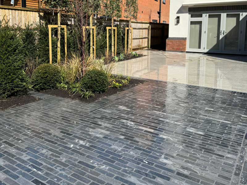 blue grey limestone setts creating a patio area designed and built by R C Phillips