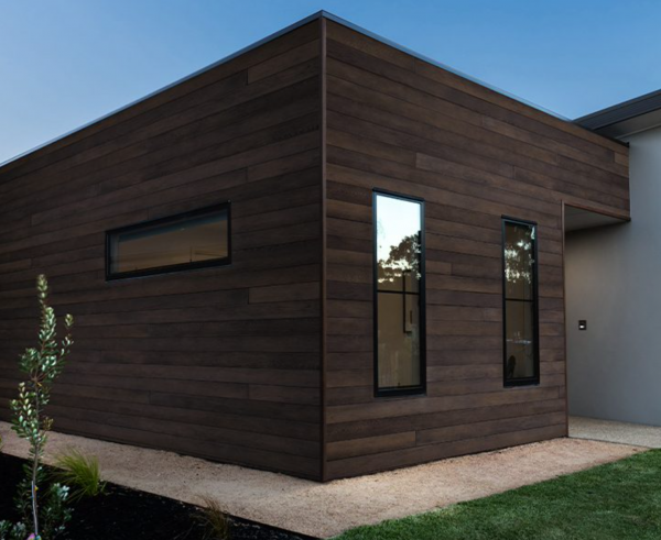 modern outbuilding with millboard composite cladding 