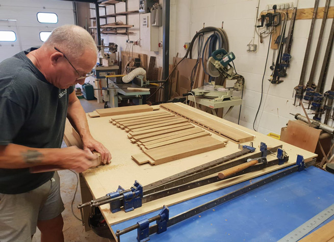 craftsman making fire pit cover