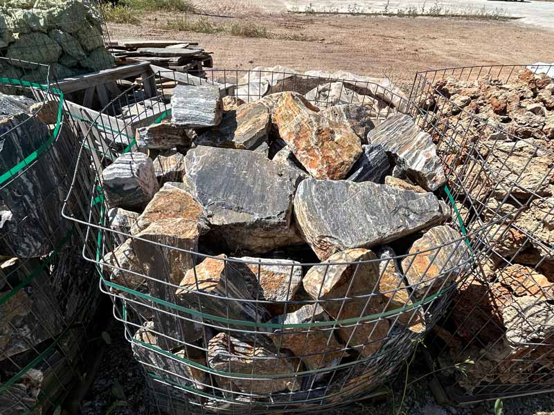 large crates filled with boulders which will be shaped to form paddlestones.