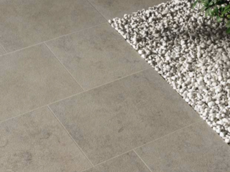 pietra jura grey porcelain paving with light grey grout