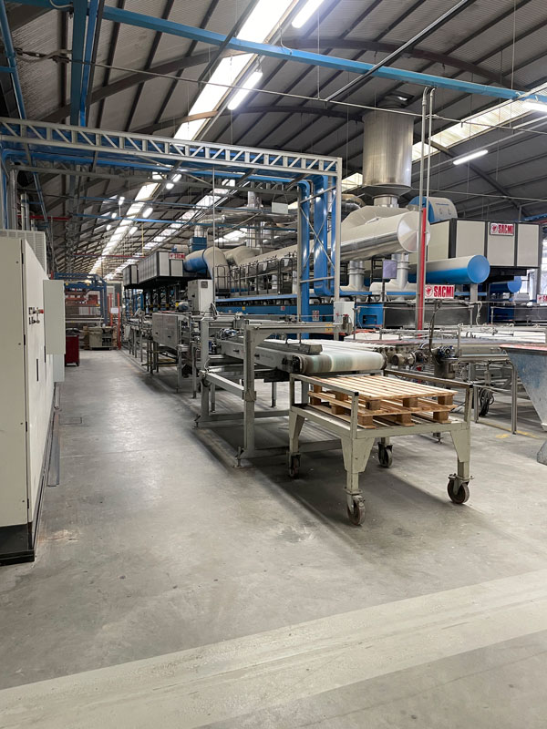 conveyor belts and machinery in porcelain paving manufacturing process