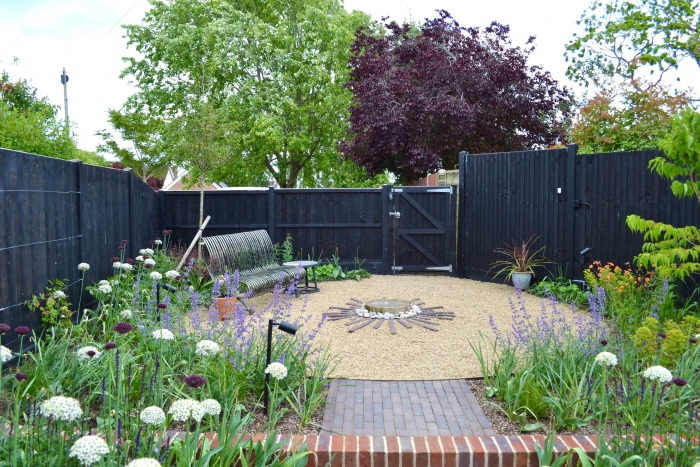 Small suffolk garden design by Rebecca Wallman featuring sinai pearl limestone paving 