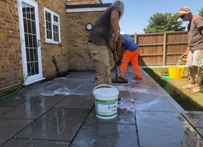 landscapers pointing and grouting
