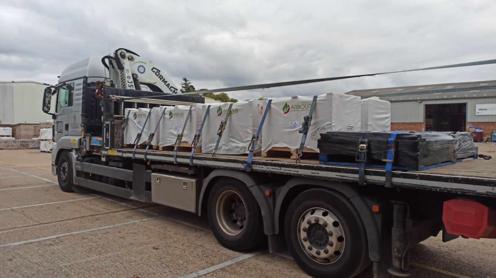 Rigid Lorry with HIAB offload hauling Arbour products