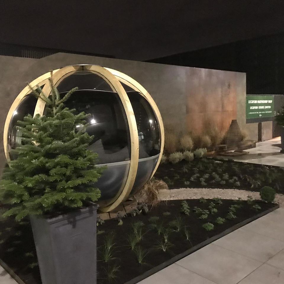 glass pod surrounded by planting on a roof terrace garden in Southampton