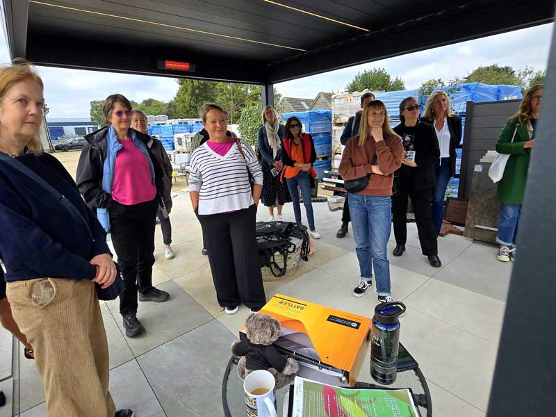 listening to a welcome talk at garden designer event