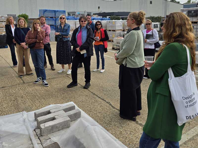 group of garden designers discussing landscaping materials at Arbour Landscape Solutions