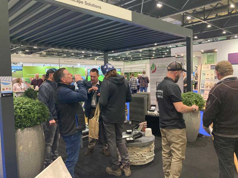 group of men at Futurescape landscaping show