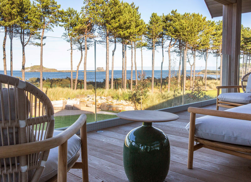 garden with large lawns and glorious view over coastal estuary